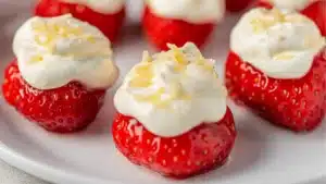 strawberries are arranged on a white plate with the words deviled strawberries above them