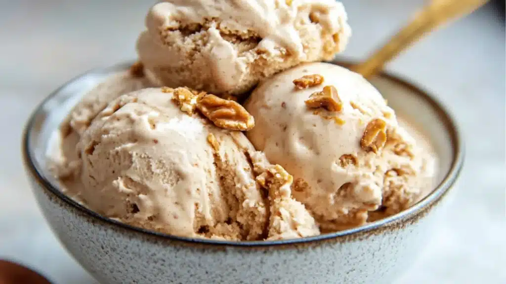 an image of scoop of peanut butter greek frozen yogurt with text overlay