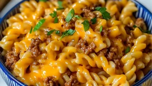 delicious beef and cheddar ranch pasta in a skillet