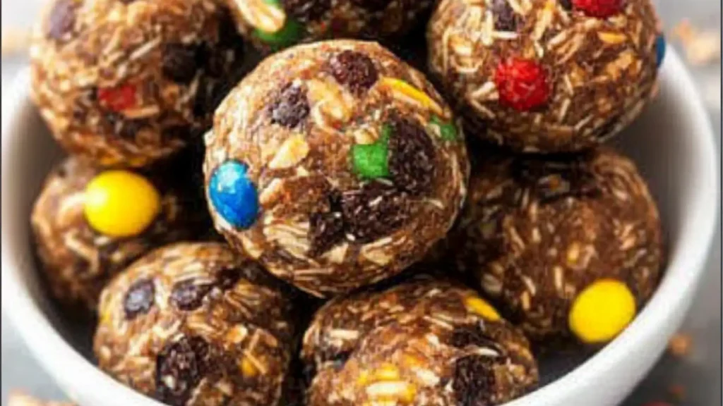 monster energy balls in a white bowl with text overlay that reads, 5 ingredient monster energy balls
