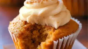 healthy sweet potato cupcakes with cream cheese frosting on top and in the middle