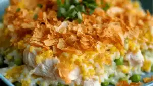 A casserole made with leftover rotisserie chicken and rice, baked to perfection for an easy, flavorful, and budget-friendly meal.