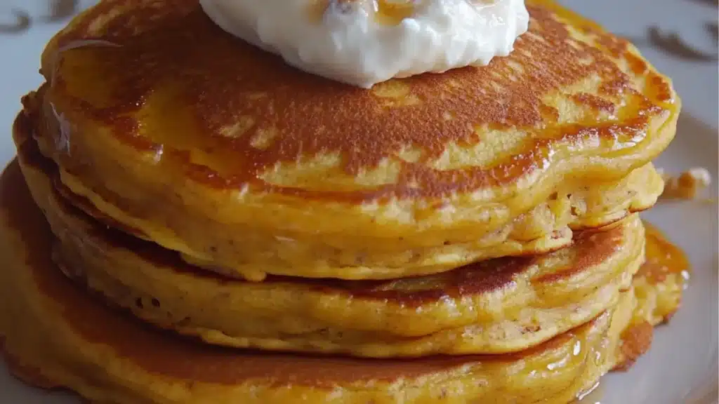 pumpkin cottage cheese pancakes on a cooling rack