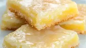 several lemon brownies stacked on top of each other