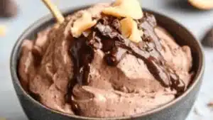the best protein fluff recipe is in two bowls with spoons and chocolate chips