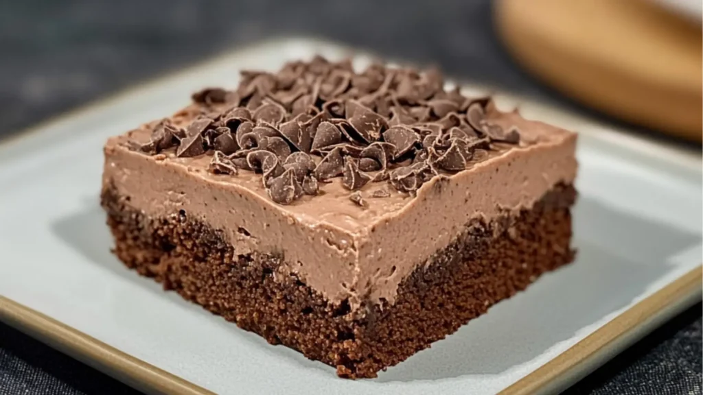 chocolate mousse brownies on a plate with the words, chocolate mousse brownies