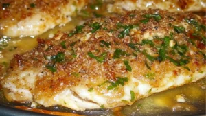 healthy honey mustard crusted tilapa for easy dinneres with lemons and herbs