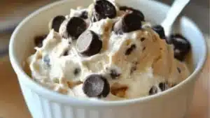 healthy peanut butter frozen yogurt in a yellow bowl
