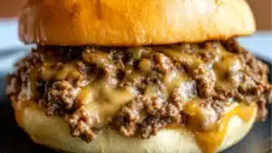 three cheesesteak sloppy joes stacked on top of each other with the words, phily cheese steak sloppy joes
