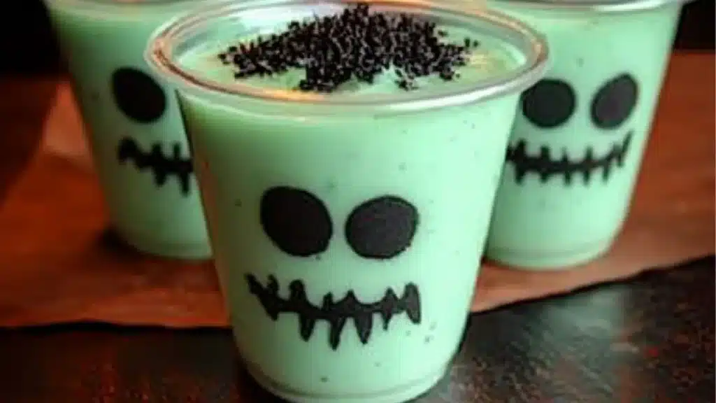 A photo of a Frankenstein Pudding Cups which is a type of halloween snacks for kids