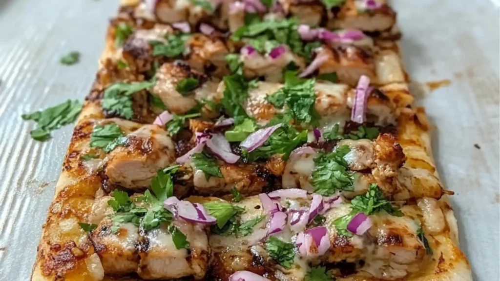 bbq chicken flatbread pizza with onions and cilantro