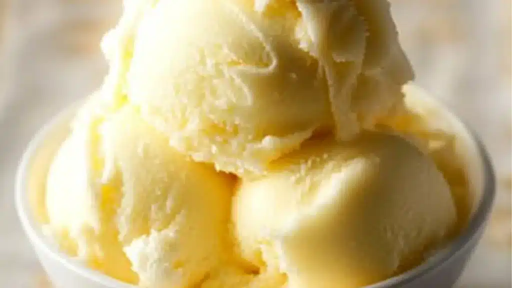 a bowl filled with ice cream next to a pineapple on the side and text overlay that reads, ninja cream dole whip