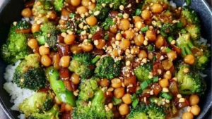 garlic broccoli stir fry with chickpeas in a bowl and on a plate