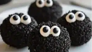 an oreo halloween balls recipe with sprinkles and chocolate on the top