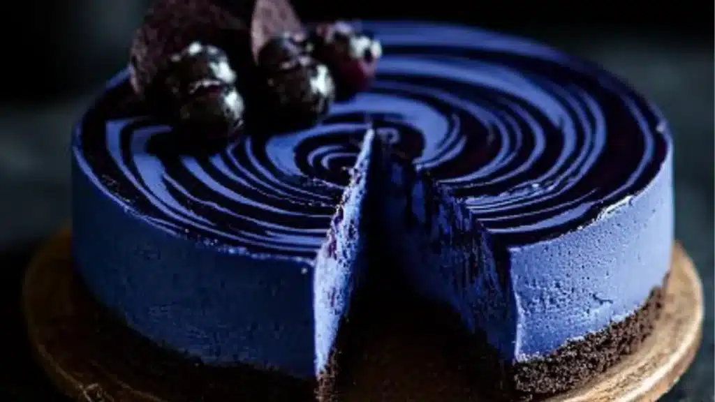 the blueberry cheesecake is ready to be eaten and served on black plates with text overlay