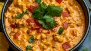 the crockpot taco dip recipe is ready to be eaten and put in an oven