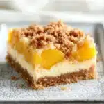 Peach Cobbler Cheesecake Bars