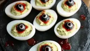 deviled eggs decorated with googly eyes and spooky halloween snack recipe creepy eyeball deviled eggs