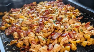 chicken bacon ranch skillet on the blackstone with text overlay that reads, chicken bacon ranch skillet on the blackstone