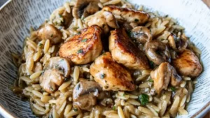 two bowls filled with pasta and mushrooms on top of a wooden table next to the words marsala magic orzo delight