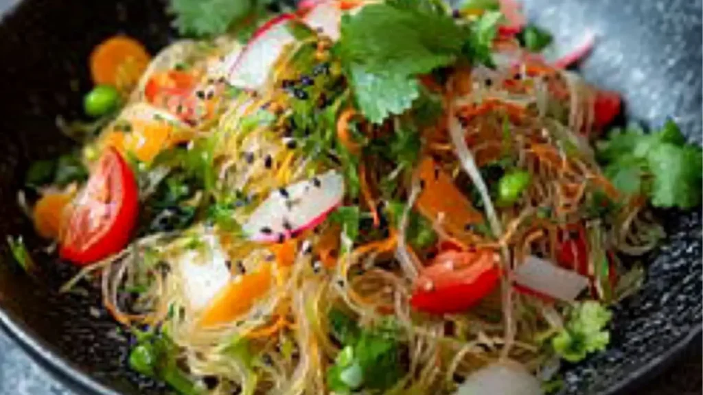 raw kelp noodles with noodle salad in a white bowl