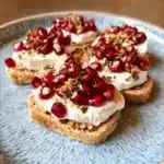 Crackers with Cream Cheese and Pomegranate Arils