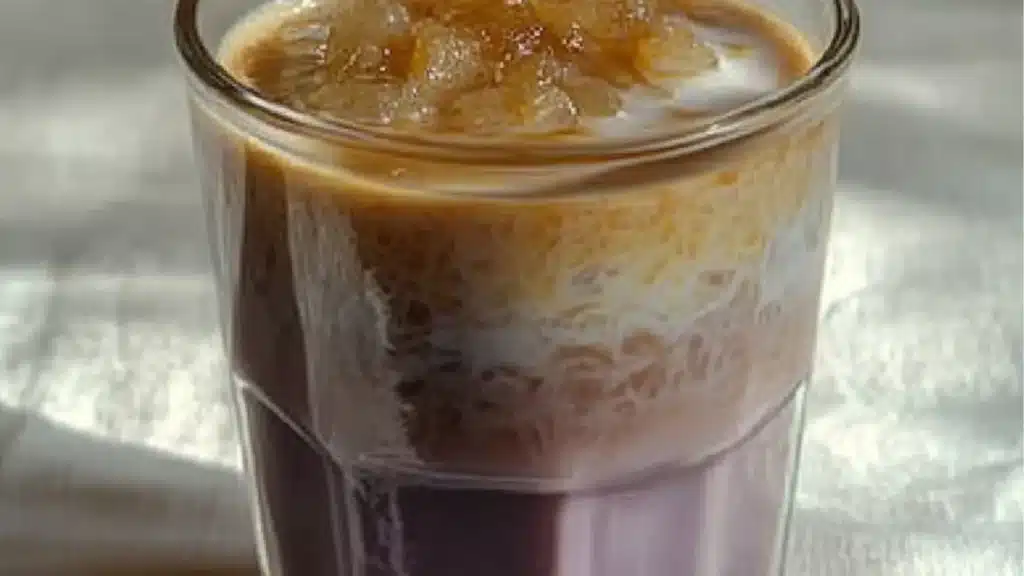 homemade taro latte recipe with lavender flowers in the background