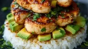 the menu for honey lime chicken and avocado rice stack is displayed on a white plate