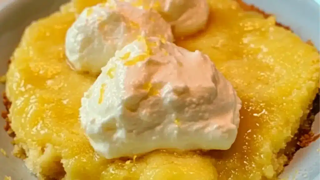 lemon cream cheese dump cake in a pan with the words lemon cream cheese dump cake