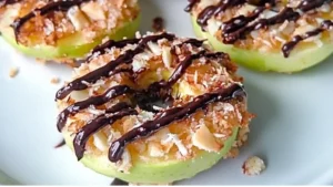 an apple and chocolate sandwich on a cooling rack with the words, apple samosas easy - ingredient healthy treat