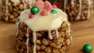 christmas treats with holly decorations on them