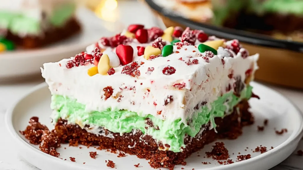 a piece of cake on a plate with candy candies