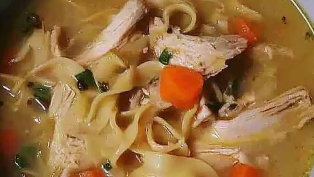 bowls of ginger chicken noodle soup with the words ginger chicken noodle soup