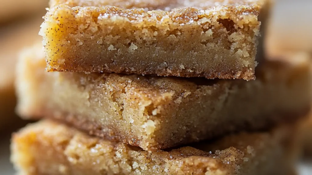 cinnamon sugar blondies on a white plate with the words, cinnamon sugar blondies
