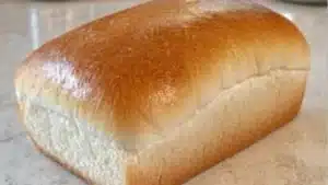 Soft loaves of fresh baked bread with Pinterest overlay.