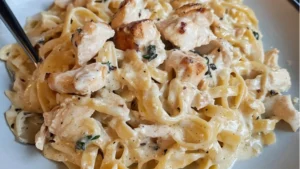 pictures of chicken alfredo in a skillet with the words irresistiblely dairy - free chicken alfredo