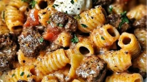 A close-up view of a bowl filled with creamy paprika steak shells, showing the rich sauce coating the pasta. This satisfying dish is perfect for anyone searching for smoky steak pasta comfort food.