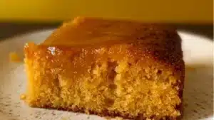 the best moist and sweet cornbread cake recipe is made with fresh cornbread, butter, and sour cream