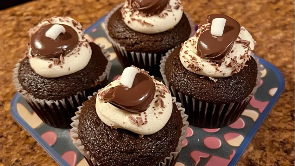 chocolate cupcakes with white frosting
