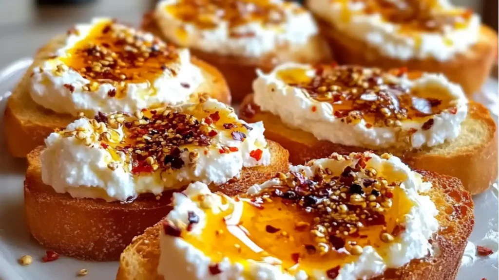 toasted bread topped with whipped cream and herbs