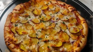 a pizza with cheese and bacon loaded baked potato pizza